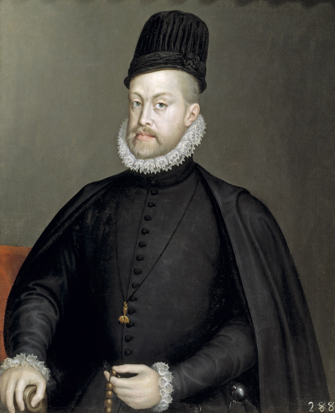 Retrato de Felipe II vestido de negro, con gorra negra y el collar del Toisón de Oro